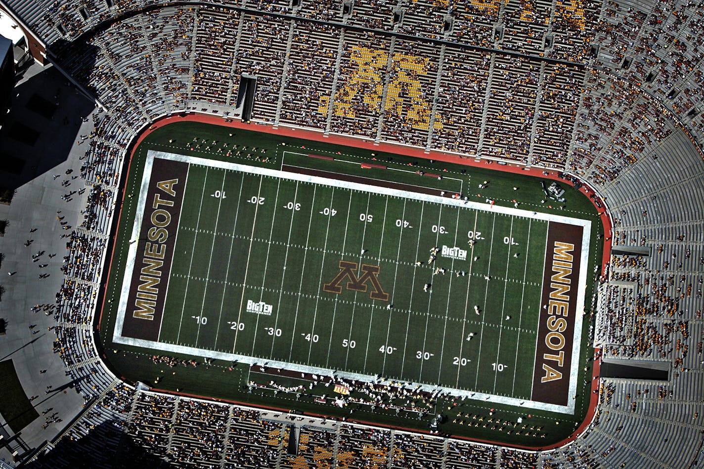 JIM GEHRZ &#x2022; jgehrz@startribune.com Minneapolis/August 22, 2009/3:10PM FOR USE IN SPECIAL SECTION ONLY Members of the University of Minnesota Golden Gophers football team held a team scrimmage at the newly constructed TCF Bank Stadium. This was the first public event hosted at the building and in addition to the scrimmage, the Gophers held a victory walk from McNamara Alumni Center to the stadium. ORG XMIT: MIN2013112919320667