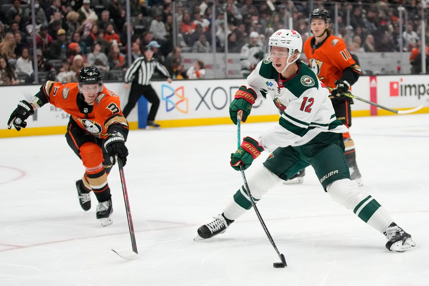 Wild left wing Matt Boldy shoots against Anaheim defenseman John Klingberg during the second period. Boldy scored in the victory.