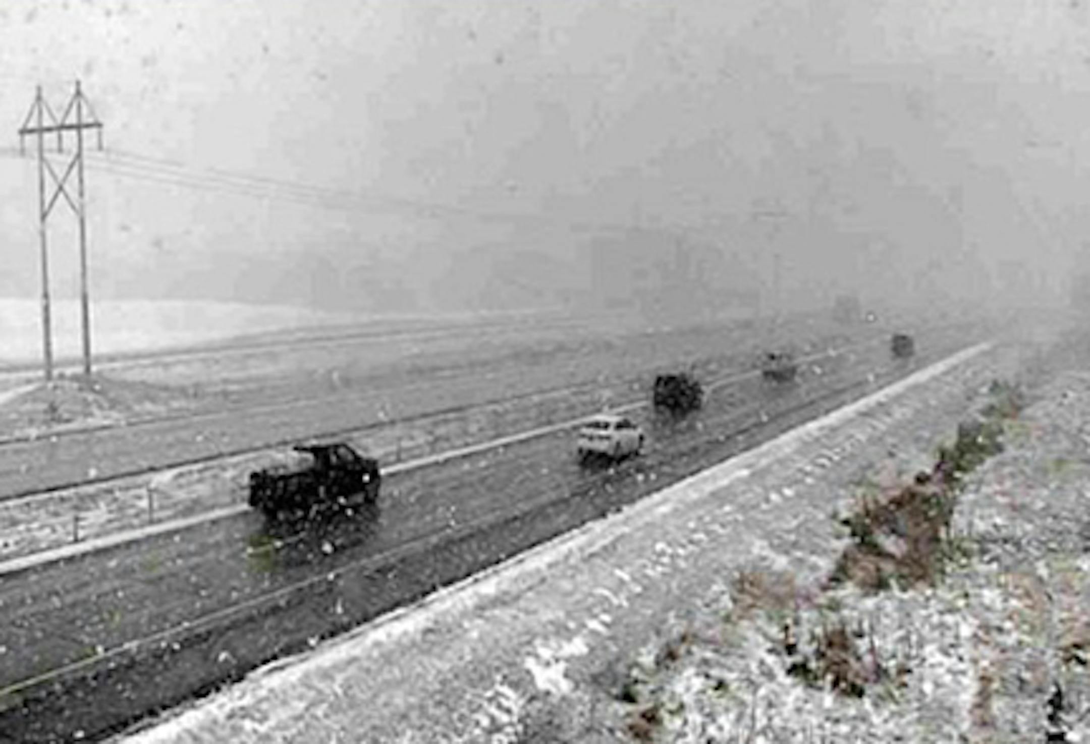 Snow gathered in fields near I-35 south of Elko New Market on Friday, April 8, 2016.
