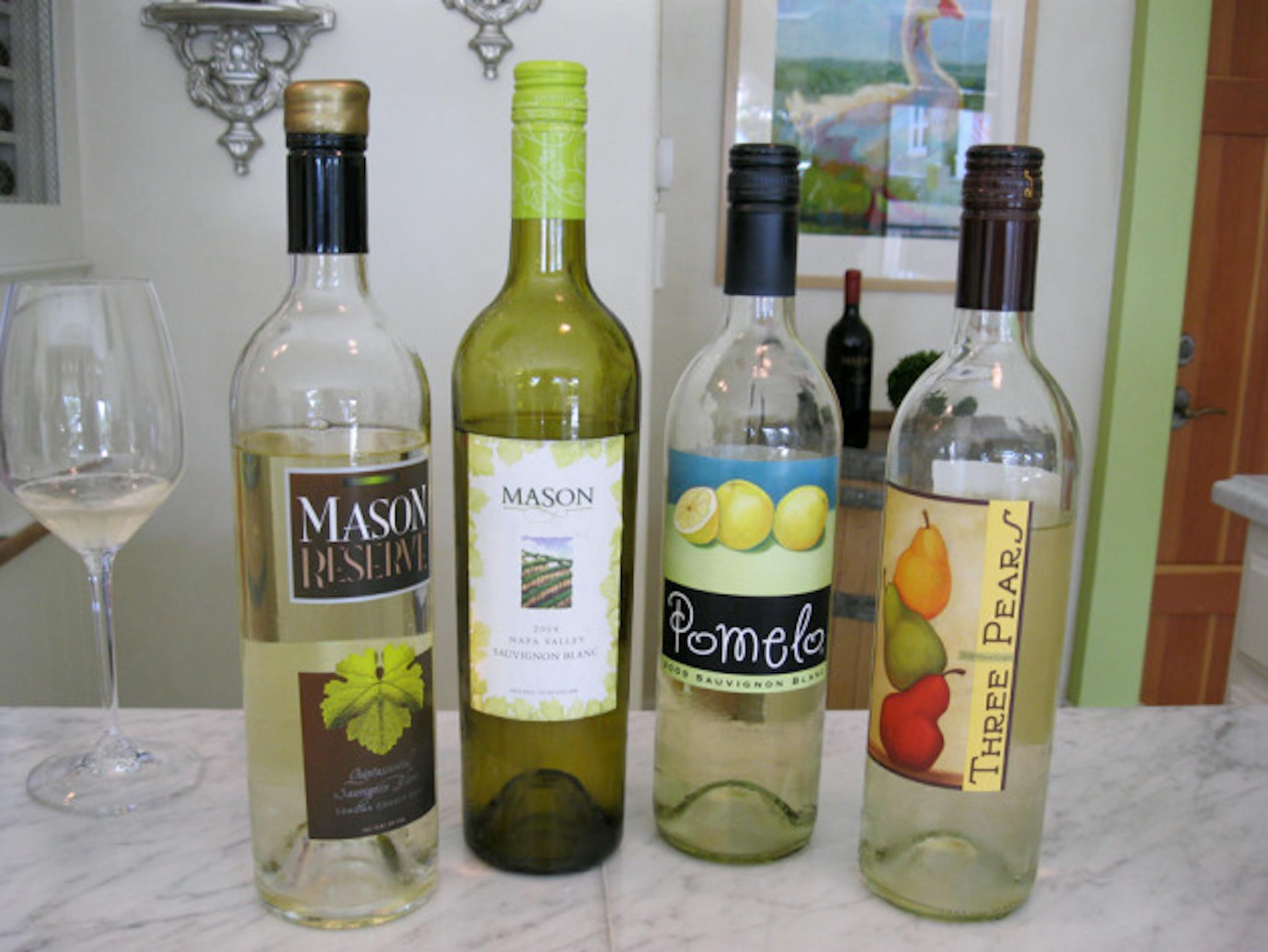 The whites ... Mason Cellars, like many wineries, swears  screw tops are the best enclosure for their wines. I love that they dipped their reserve Sauv Blanc (far left) in wax.