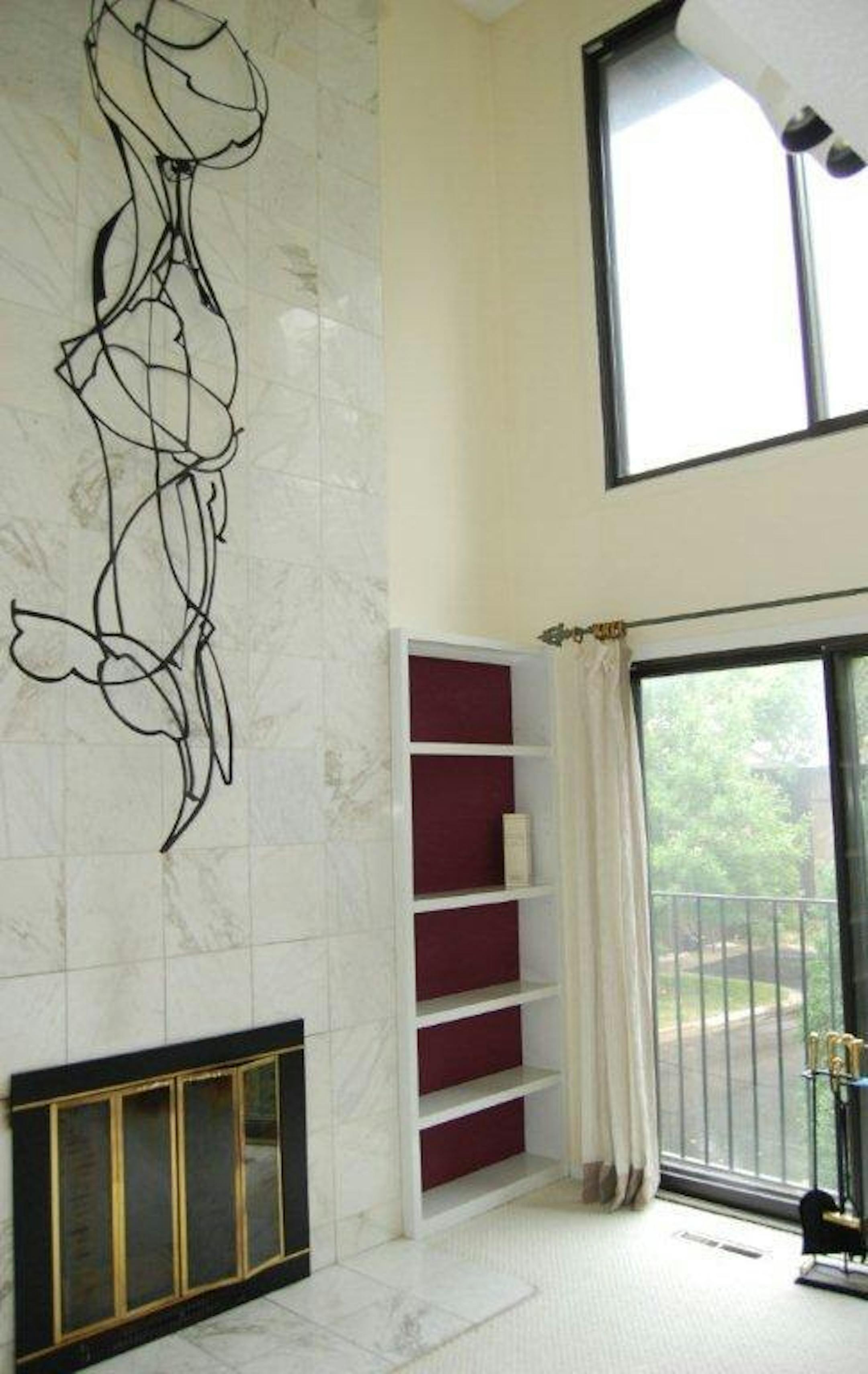 Before of living room fireplace.
