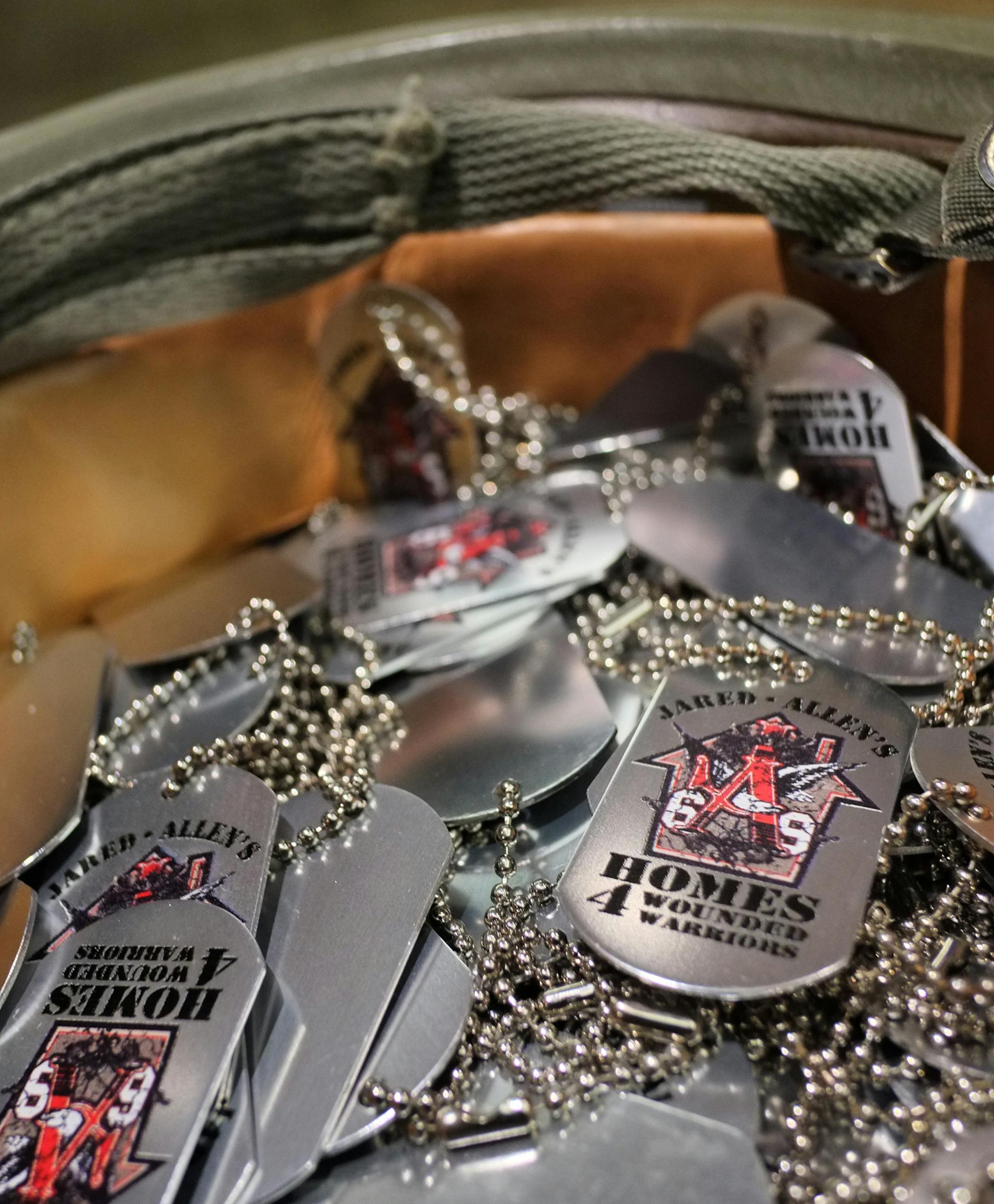 Minnesota Vikings star Jared Allen charity, Homes for Wounded Warriors, helps remodel homes for wounded servicemen and women. For example; Joshua Bullis, who lost both legs in Afghanistan, and girlfriend Tory Walker, who attended Allen's charity gala in Minnesota last november, was given $50,000 in upgrade to their Arizona home. A silent auction was held the night of the gala some of the items were, [ STAR TRIBUNE/TOM WALLACE Assignments #20026191A July 10, 2013 SLUG & MAGIC SAXO#: 964145 jared0