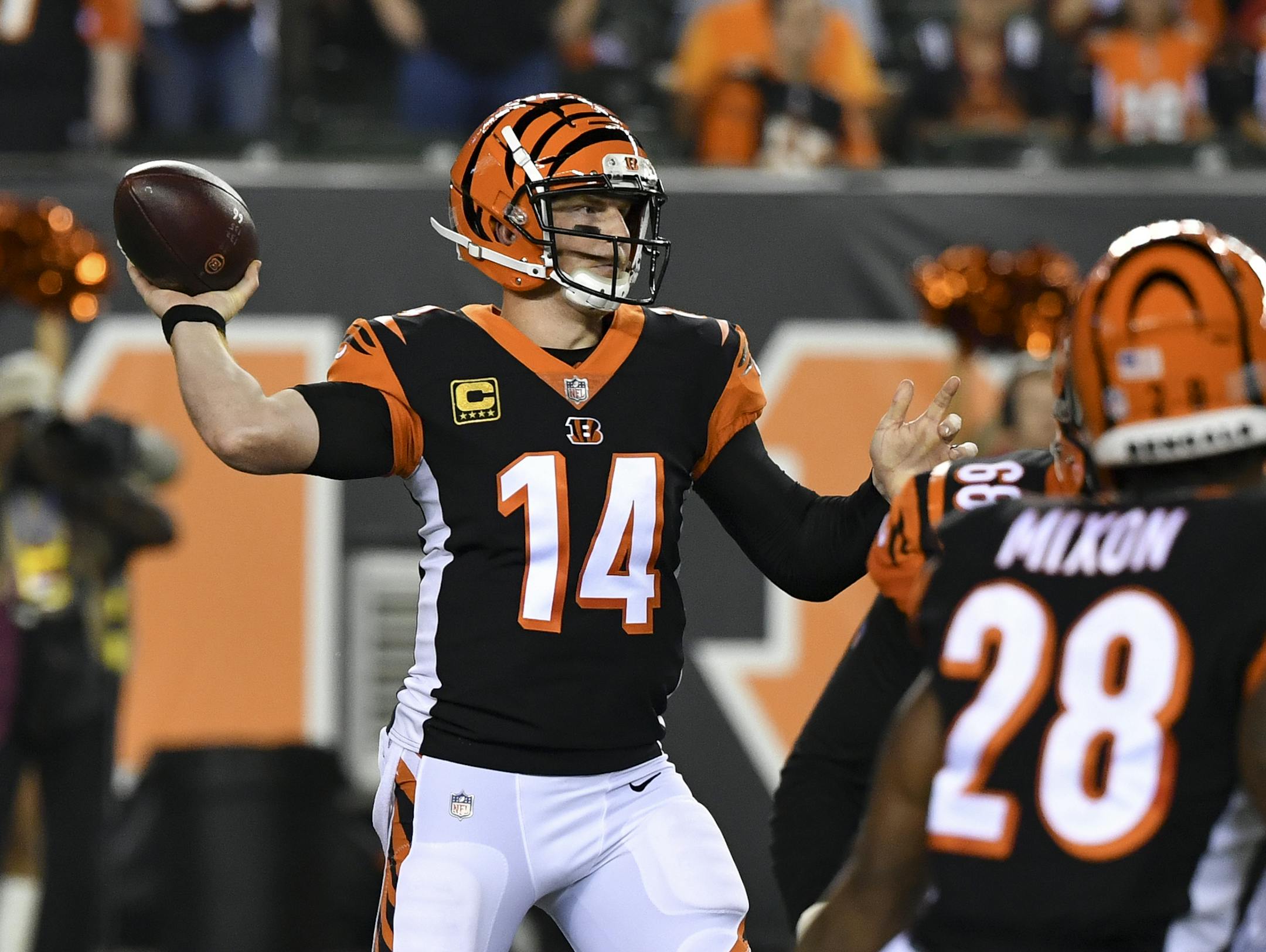 Cincinnati Bengals quarterback Andy Dalton throws in the first half of an NFL football game against the Baltimore Ravens, Thursday, Sept. 13, 2018, in Cincinnati. (AP Photo/Bryan Woolston)