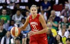 Washington Mystics' Elena Delle Donne heads up court against the Seattle Storm in the first half of Game 1 of the WNBA basketball finals Friday, Sept.