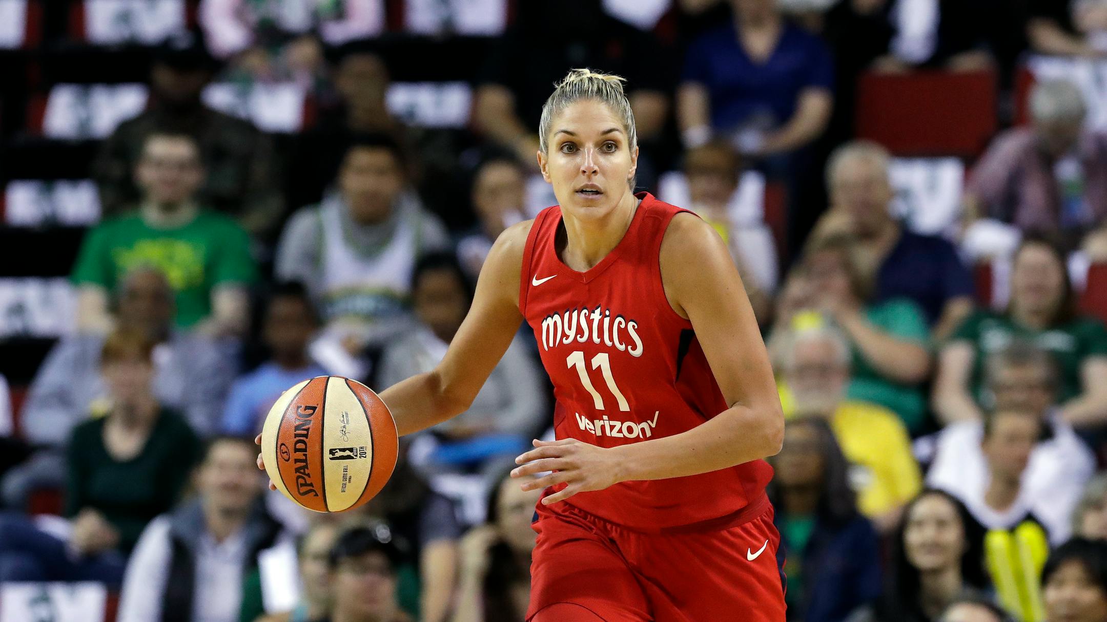 Washington Mystics' Elena Delle Donne heads up court against the Seattle Storm in the first half of Game 1 of the WNBA basketball finals Friday, Sept. 7, 2018, in Seattle. (AP Photo/Elaine Thompson)