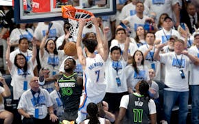 The Thunder's Chet Holmgren dunks the ball in the fourth quarter Tuesday at Paycom Center in Oklahoma City.