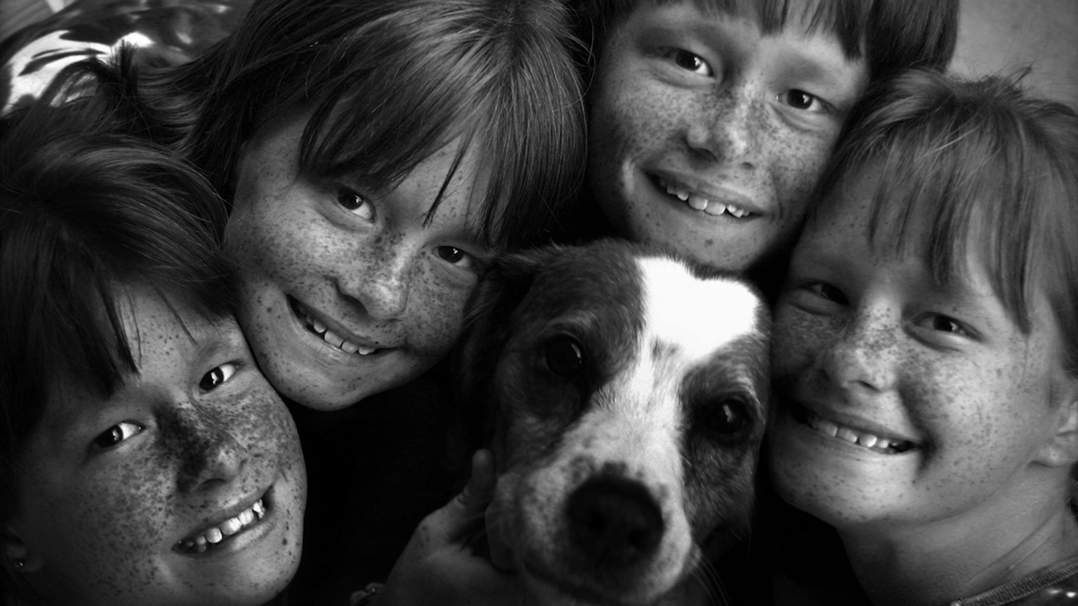 Star-Tribune Minneapolis Division III Brian Peterson Multiple Images Quad Squad The Durst Quadruplets, Megan, Calli, Sarah and Kendra with the family dog Maggie.
