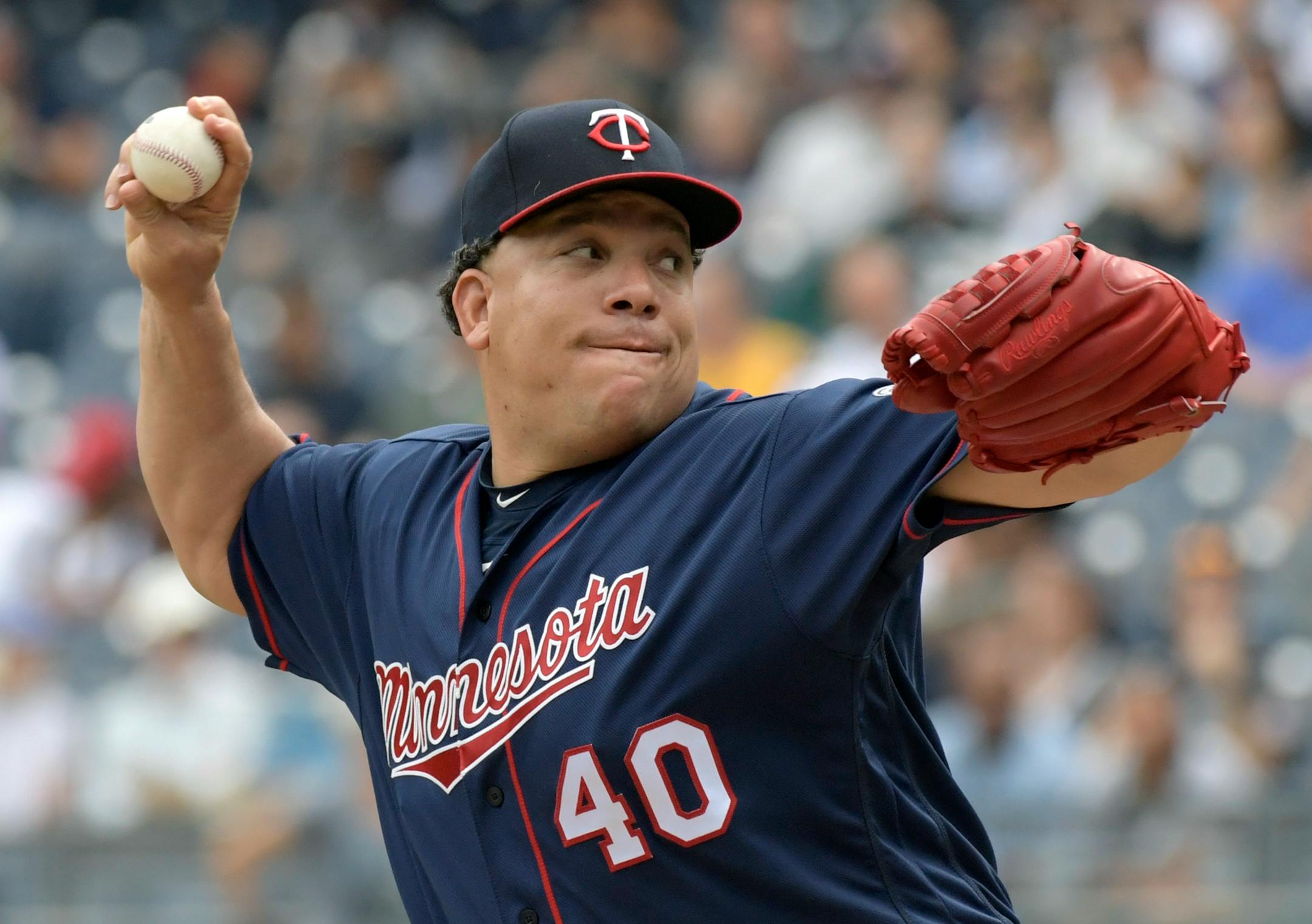 Minnesota Twins pitcher Bartolo Colon delivers the ball to the New York Yankees during the first inning of a baseball game Wednesday, Sept.20, 2017, at Yankee Stadium in New York. (AP Photo/Bill Kostroun)