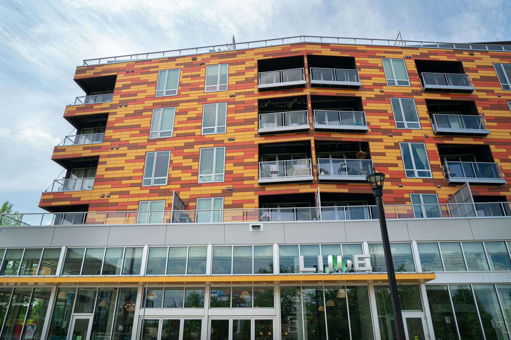 Lime has a giant name sign in the lobby and its colorful exterior reflects the brand's 'zesty' name. https://limeapartments.com/gallery Address: 2904 Lyndale Avenue S Minneapolis, MN 55408