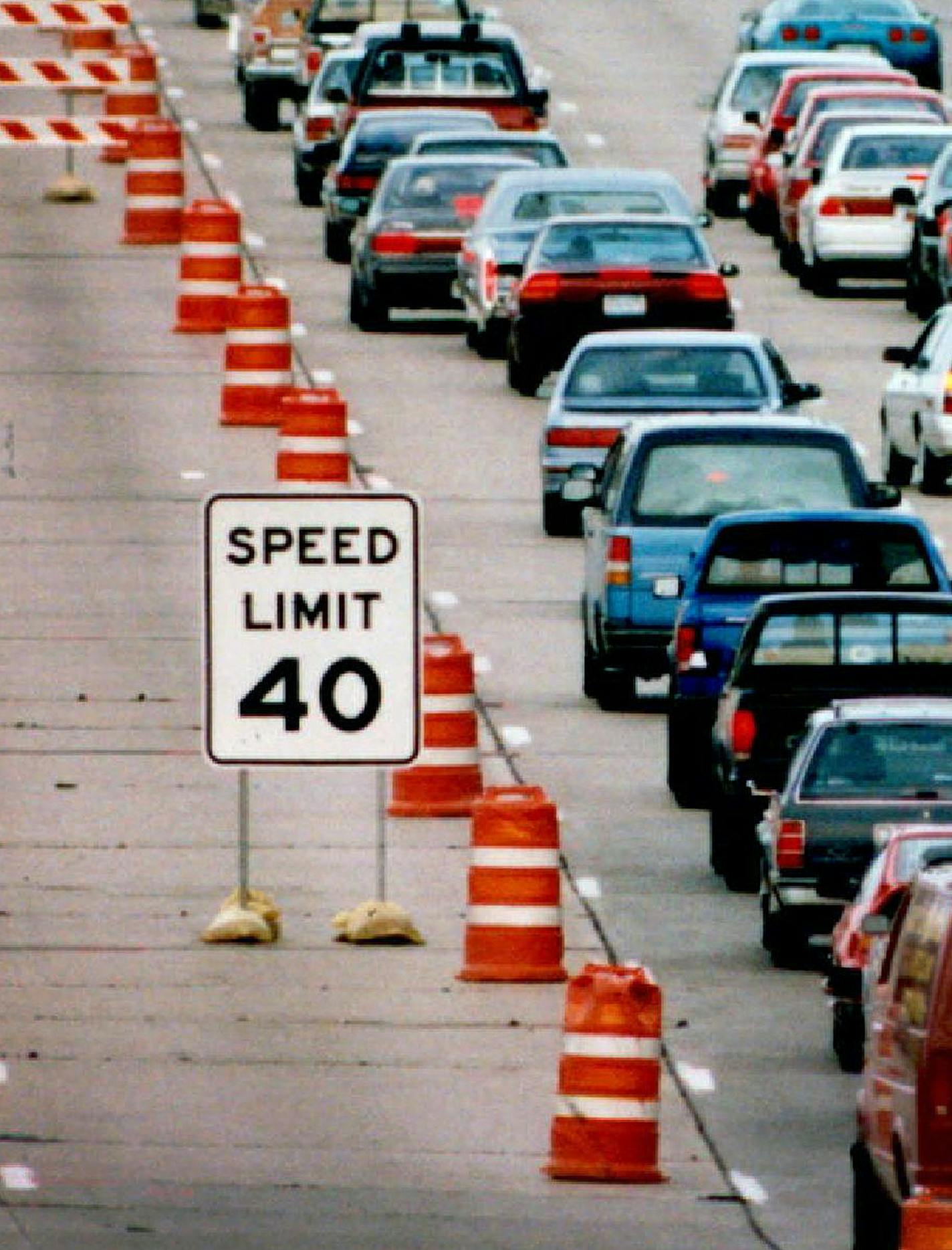 June 13, 1994 Traffic will move slowly through the Interstate 35W and Highway 36 common area in Roseville as lane closures in both directions cause traffic to be restricted to one lane in each direction. Except traffic to back up for miles during the rush hours. This photo was taken looking east from near Industrial Blvd. at about 6 p.m. Monday. June 14, 1994 John Haselmann, Minneapolis Star Tribune ORG XMIT: MIN2015040217080156