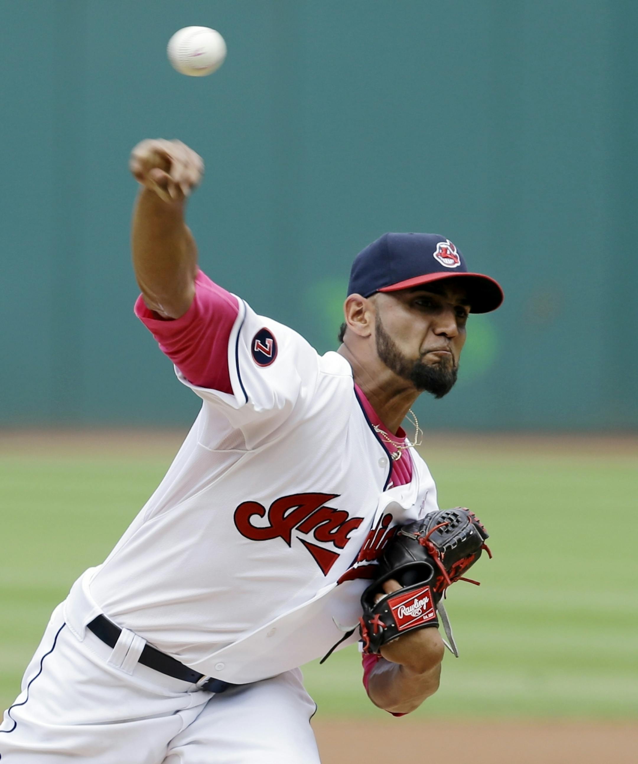 Cleveland Indians starting pitcher Danny Salazar delivers in the first inning of a baseball game against the Minnesota Twins, Sunday, May 10, 2015, in Cleveland. (AP Photo/Tony Dejak) ORG XMIT: MIN2015051015081744