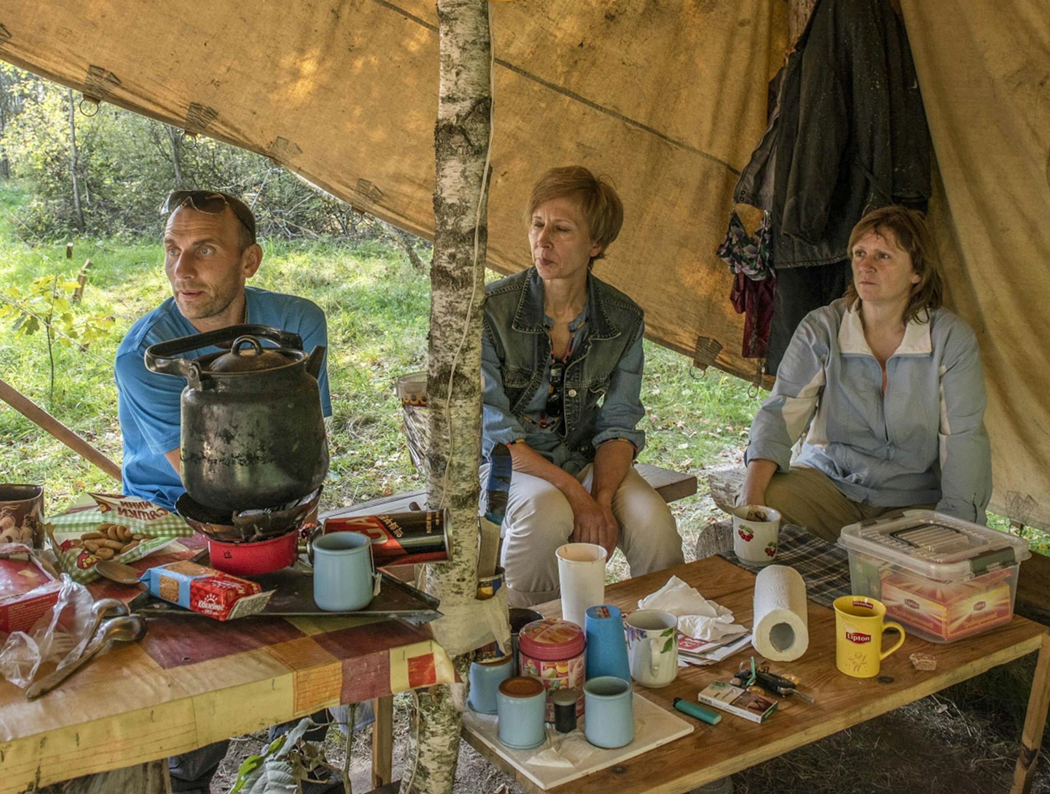 Activists sit in the central tent of the protest camp outside Moscow. Some protesters have been based at the camp 24 hours a day since March. MUST CREDIT: Bloomberg photo by Elena Chernyshova