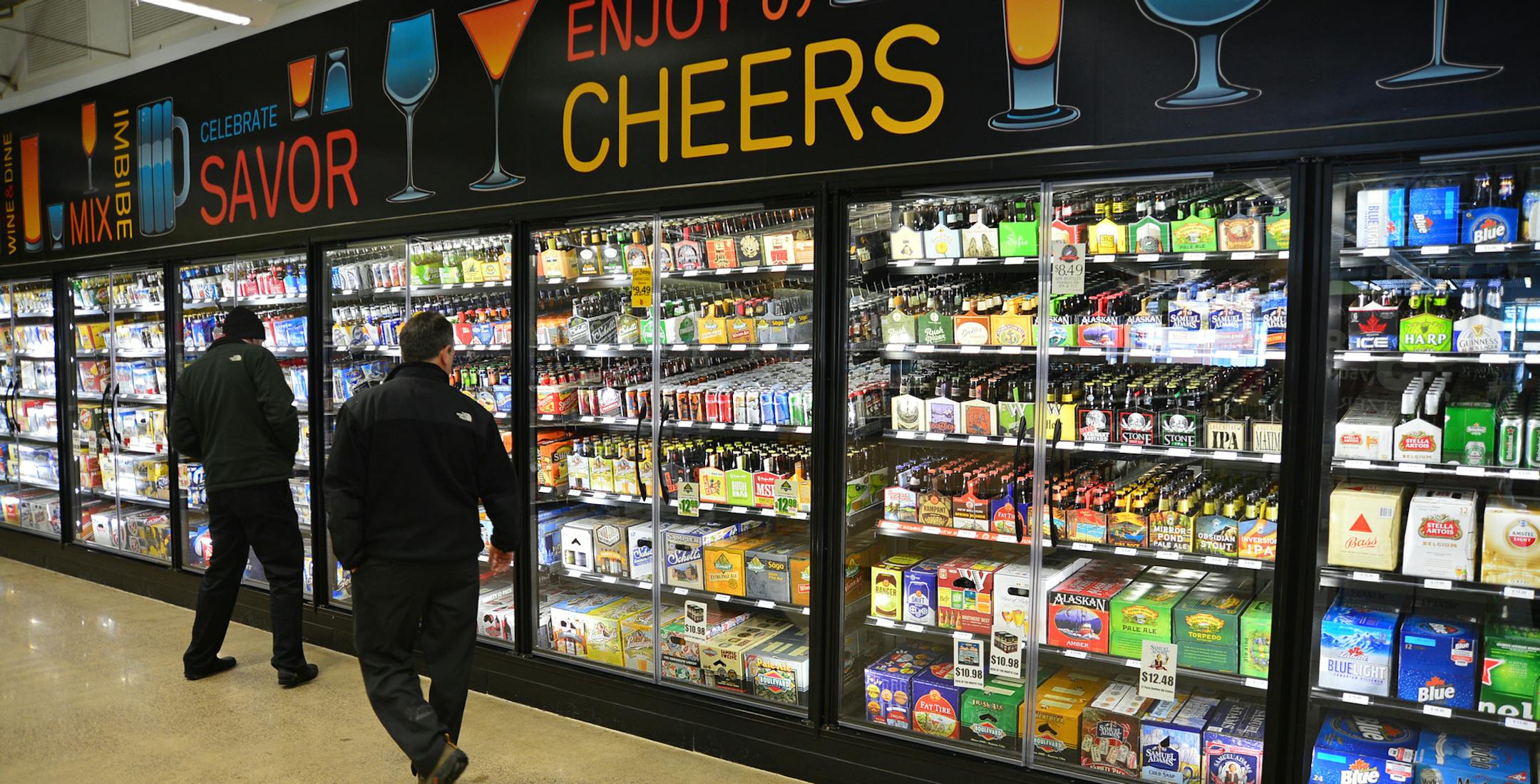 Muni liquor stores like those in Richfield have stepped up their game in recent years to keep up in an increasingly competitve landscape. Bill Fillmore, Richfield's liquor operations director said the store wide beer cooler which is lit with LED on the sides of it's wide doors is a major focal point .] Richard.Sennott@startribune.com Richard Sennott/Star Tribune Richfield, Minn. Monday 1/27/2014) ** (cq)