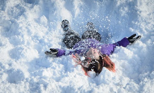 Students at Paideia Academy love it when the snow falls. For recess, they get to bundle up in their snowpants, boots and mittens and leap off of, or roll down the huge mountains of snow pushed off of their paved play area. Conditions were perfect for snow rolling Wednesday after a foot of snow fell in the south suburbs. Paideia Academy is a Public Charter School for Grades K-8 Located in Apple Valley. ] GLEN STUBBE * gstubbe@startribune.com Wednesday, February 3, 2016