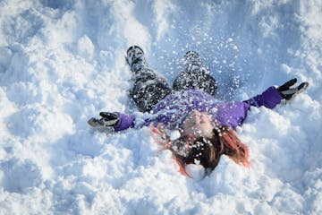 Students at Paideia Academy love it when the snow falls. For recess, they get to bundle up in their snowpants, boots and mittens and leap off of, or r