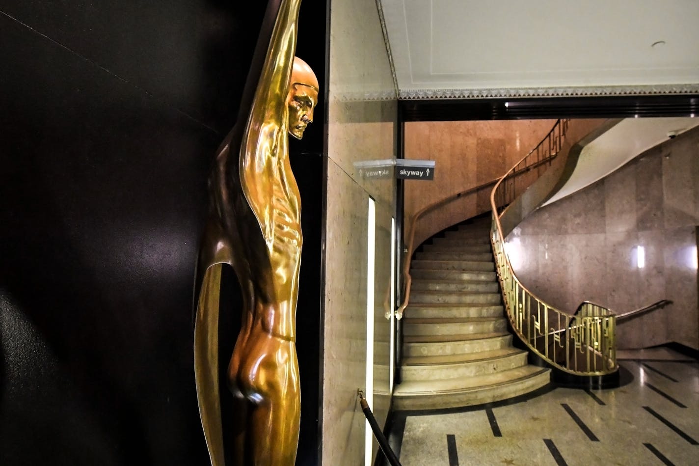 The sculpture in the lobby is Wings by Oskar J. W. Hansen. ] GLEN STUBBE &#x2022; glen.stubbe@startribune.com Thursday, February 22, 2018 The 26-story Rand Tower in downtown Minneapolis was completed in 1929. Much of the building is covered in Art Deco ornamentation with an aviation theme. The sculpture in the lobby is Wings by Oskar J. W. Hansen.