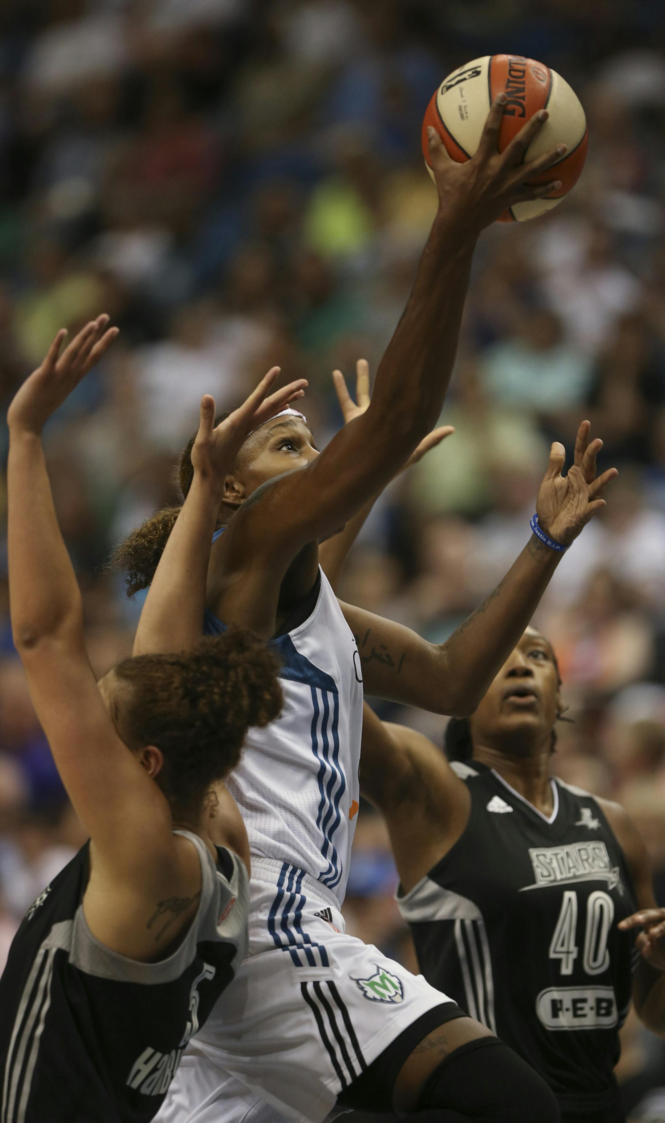 Rebecca Brunson of the Lynx went up for a first quarter basket Sunday night at Target Center. JEFF WHEELER ï jeff.wheeler@startribune.com The Minnesota Lynx met the San Antonio Stars in an WNBA game Sunday night, July 12, 2015 at Target Center in Minneapolis.
