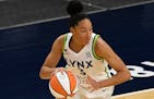 Minnesota Lynx forward Aerial Powers (3) controls the ball against the Phoenix Mercury during a WNBA basketball game, Friday, May 14, 2021, in Minneap