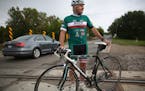 Bob Cattanach returned to the railroad crossing at Broadway Avenue near downtown St. Paul Park, where he was injured riding three years ago.
