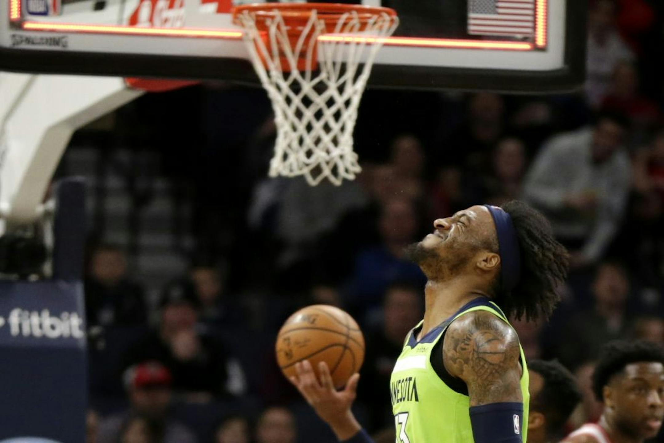 Minnesota Timberwolves forward Robert Covington reacts after missing a shot at the end of the third quarter against the Toronto Raptors during an NBA basketball game Saturday, Jan. 18, 2020, in Minneapolis.