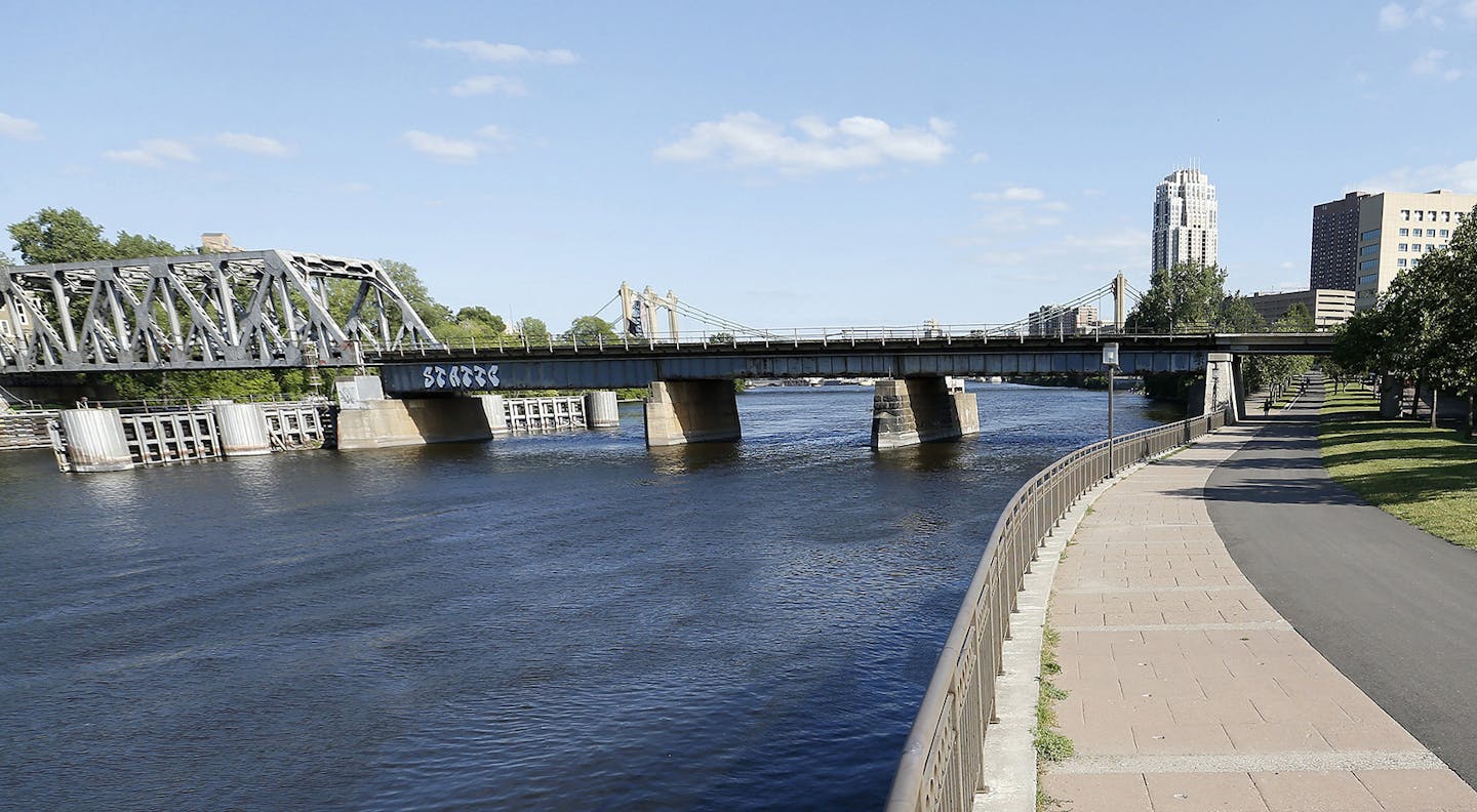 Minneapolis councilman Jacob Frey during an evening run along the Mississippi river. Frey still runs about 5 days a week. ] CARLOS GONZALEZ cgonzalez@startribune.com - July 23, 2015, Minneapolis, MN, My Outdoor Life profile of Minneapolis councilman Jacob Frey, ORG XMIT: MIN1507241228412093