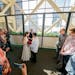 Elizabeth and Juan Ruiz-Gonzalez, surrounded by family, celebrated their four-month relationship by exchanging rings and vows.