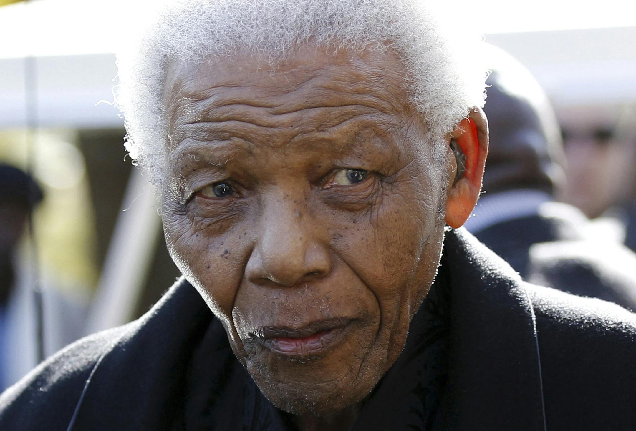 FILE - In this June 17, 2010 file photo, former South African President Nelson Mandela leaves the chapel after attending the funeral of his great-granddaughter Zenani Mandela in Johannesburg, South Africa. The South African presidency says Nelson Mandela was re-admitted to hospital with a recurrence of a lung infection Thursday March 28, 2013. (AP Photo/Siphiwe Sibeko, Pool, File)
