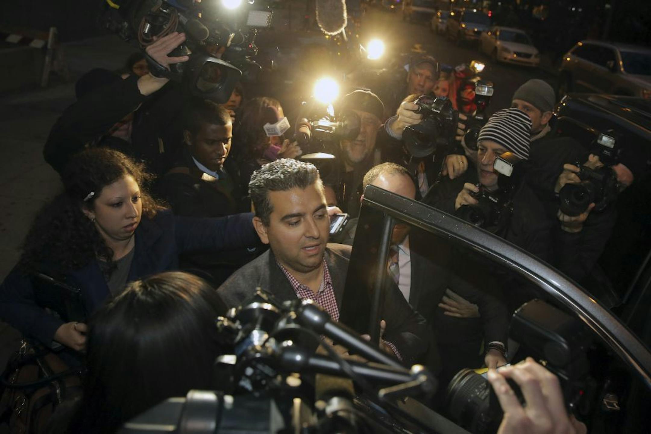Bartolo Valastro Jr., star of the show "Cake Boss," faces the cameras following his arraignment on drunken driving charges in New York, Nov. 13, 2014. The bakery owner and reality TV fixture was pulled over by officers who reported seeing his yellow 2014 Corvette driving erratically in Midtown Manhattan.