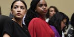 Rep. Alexandria Ocasio-Cortez, D-N.Y., left, Rep. Ayanna Pressley, D-Mass., center, and Rep. Rashida Tlaib, D-Mich., right, attend a House Oversight C