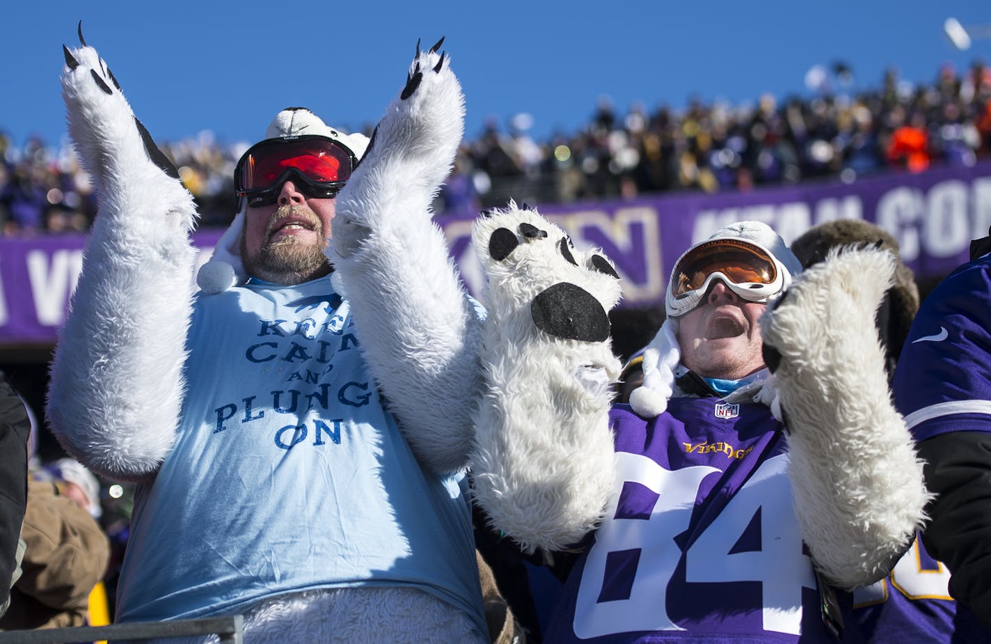 Dressed as polar bears, Vikings Fans Devin Kaasa, right, of Albert Lea, and Mike Kane, of Minneapolis, cheered for the Vikings in the second quarter against Seattle. ] (AARON LAVINSKY/STAR TRIBUNE) aaron.lavinsky@startribune.com The Minnesota Vikings played the Seattle Seahawks in the Wild-Card round of the NFL Playoffs on Sunday, Jan. 10, 2016 at TCF Bank Stadium in Minneapolis, Minn.