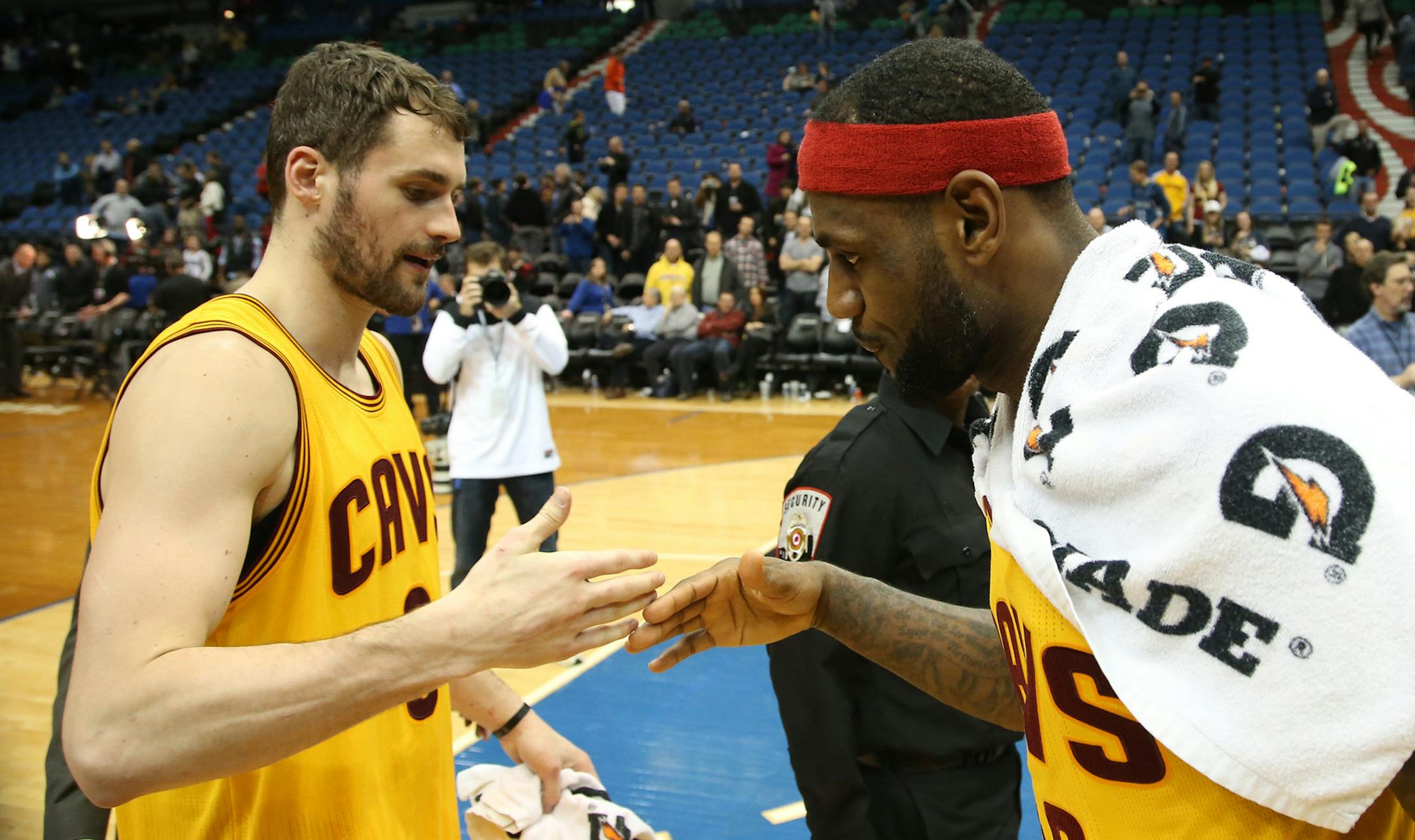 Cavaliers Kevin Love and LeBron James slap five after their win against the Wolves before heading got the locker room. ] (KYNDELL HARKNESS/STAR TRIBUNE) kyndell.harkness@startribune.com Timberwolves vs Cleveland at the Target Center in Minneapolis Min., Saturday, January 31, 2015. Cavaliers won over the Wolves 106-90.