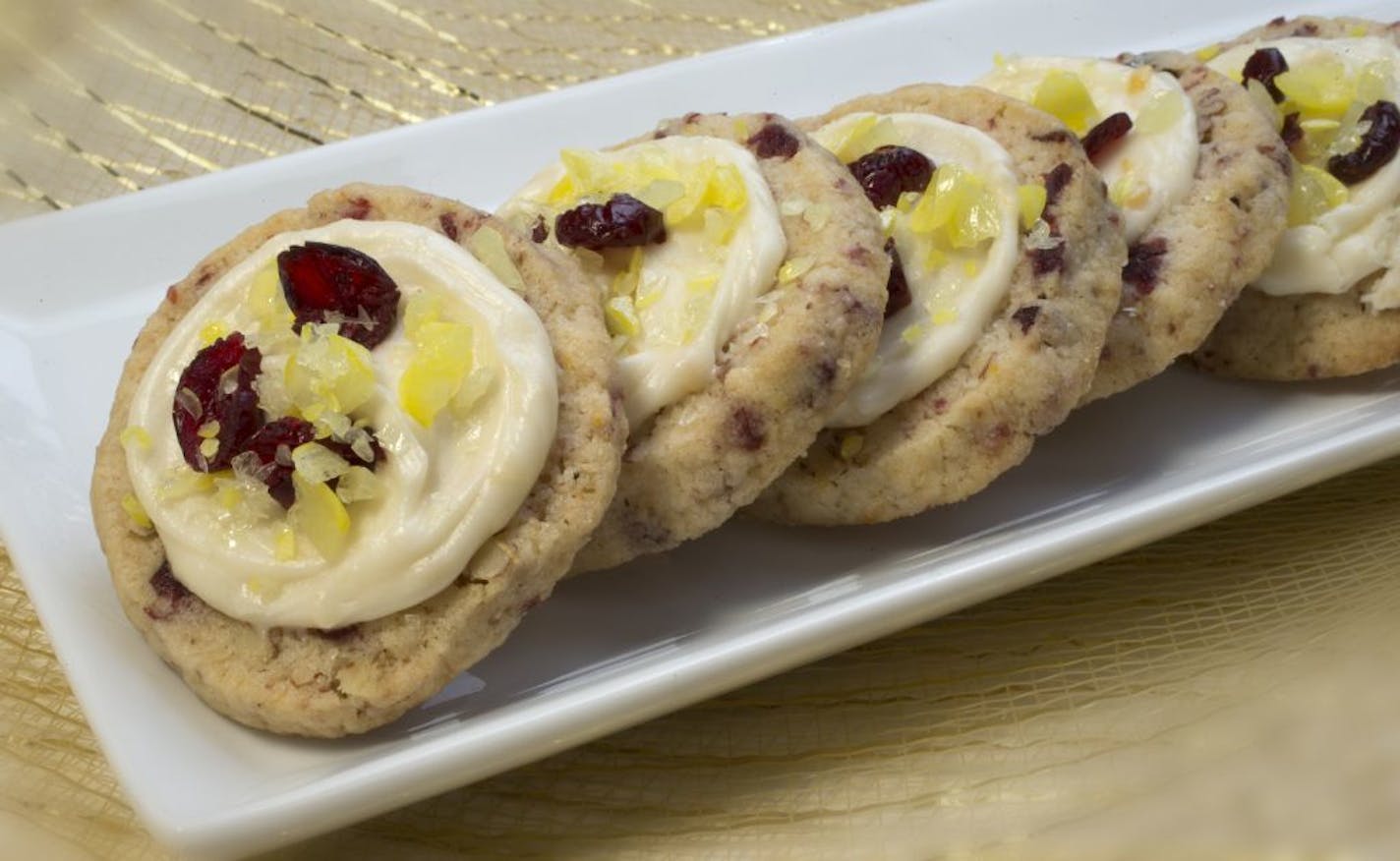 Caption for cookies: The 2014 Taste holiday cookie contest winners include: Italian Almond Cookies, Tart & Sassy Cranberry Lemon Drops; Chocolate Thumbprints; Macadamia Nut Tarts and Espresso-Hazelnut Truffle Cookies. The annual Star Tribune cooky contest