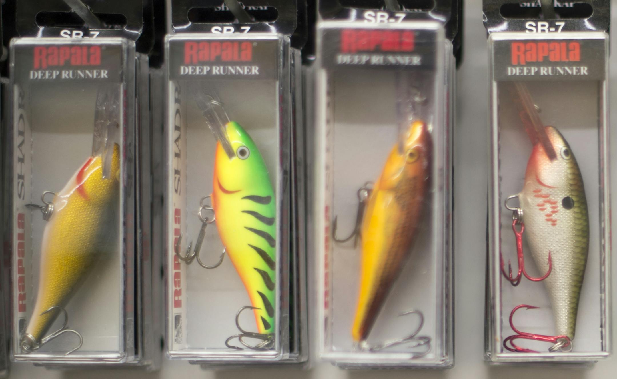 A colorful assortment of Rapala fishing lures on display.