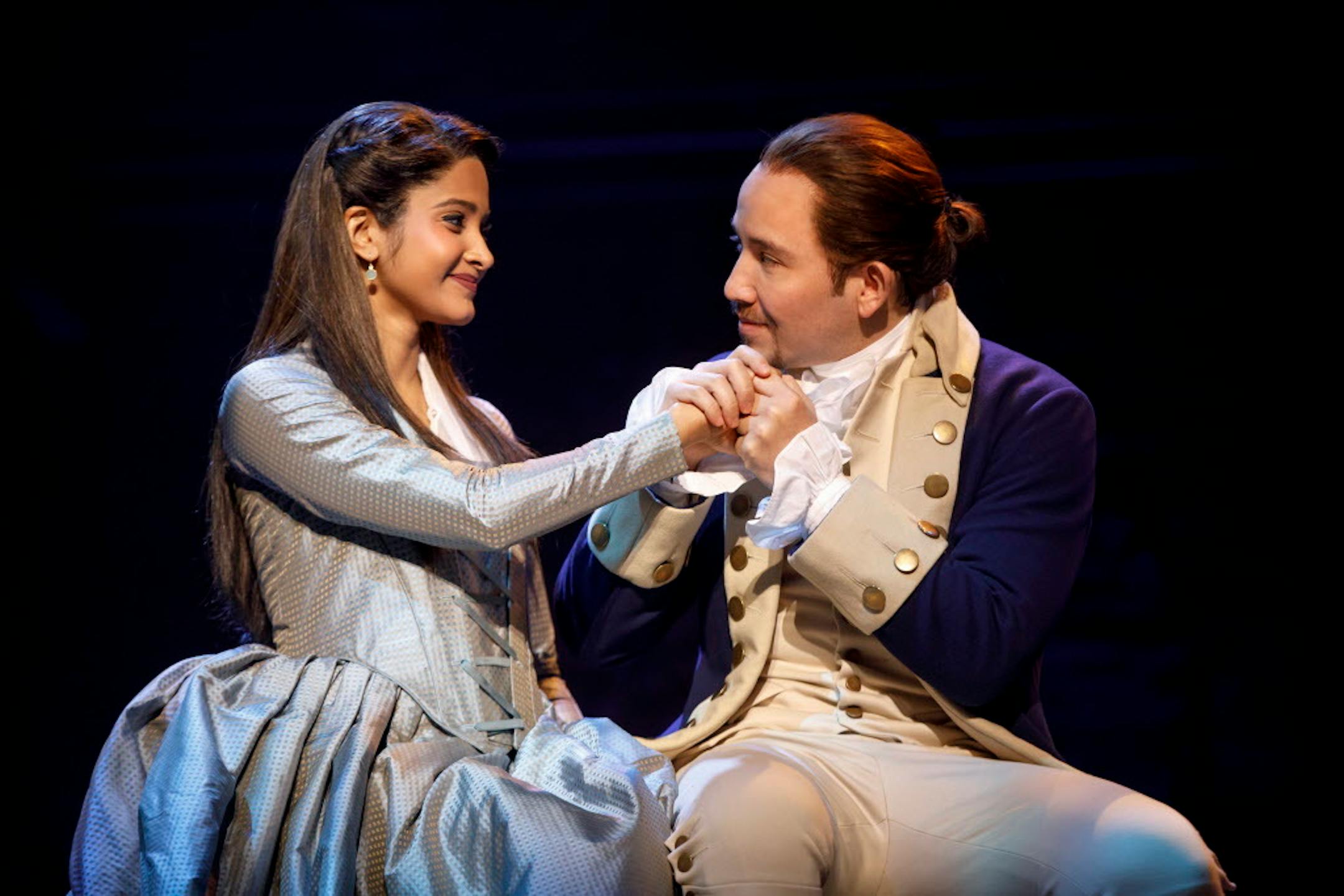Shoba Narayan as Eliza Schuyler and Joseph Morales as Alexander Hamilton in "Hamilton."