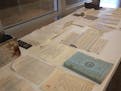 The contents of a time capsule from 1920 found in the cornerstone of the old Owatonna High School earlier this year. Courtesy Steele County Historical