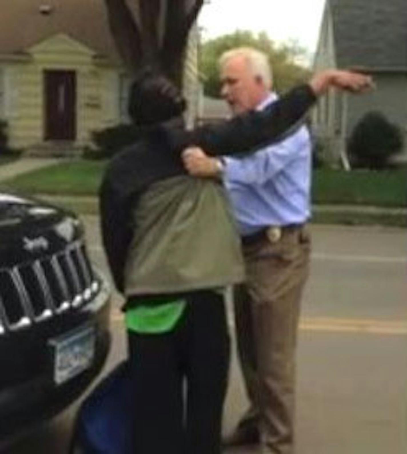 A video of an Edina police officer stopping a black man walking on a street around a construction area has gone viral on social media.