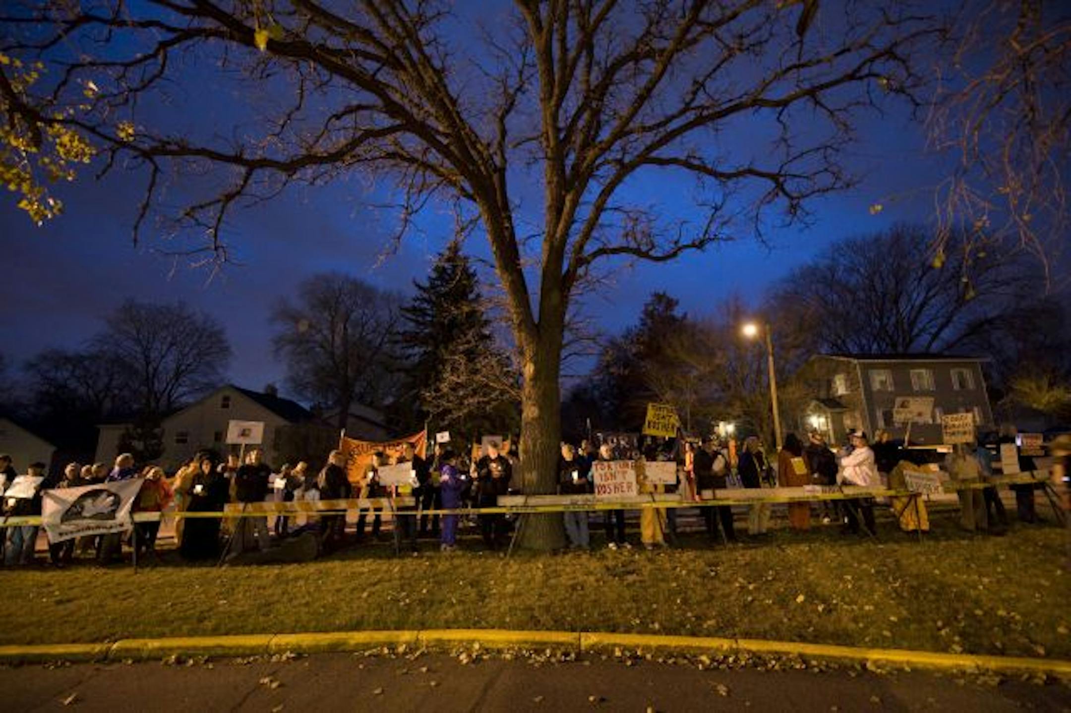 Protesters outside the Beth El Synagogue in St.Louis Park, protesting the visit of former secretary of state Condoleezza Rice.