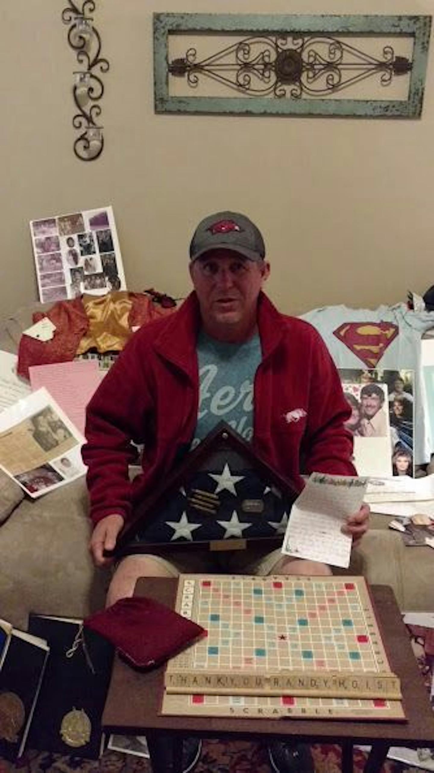 Tim Burchell with some of the items that belonged to his father. He rediscovered them four years after they were sent to him by his stepsiblings in Minneapolis.