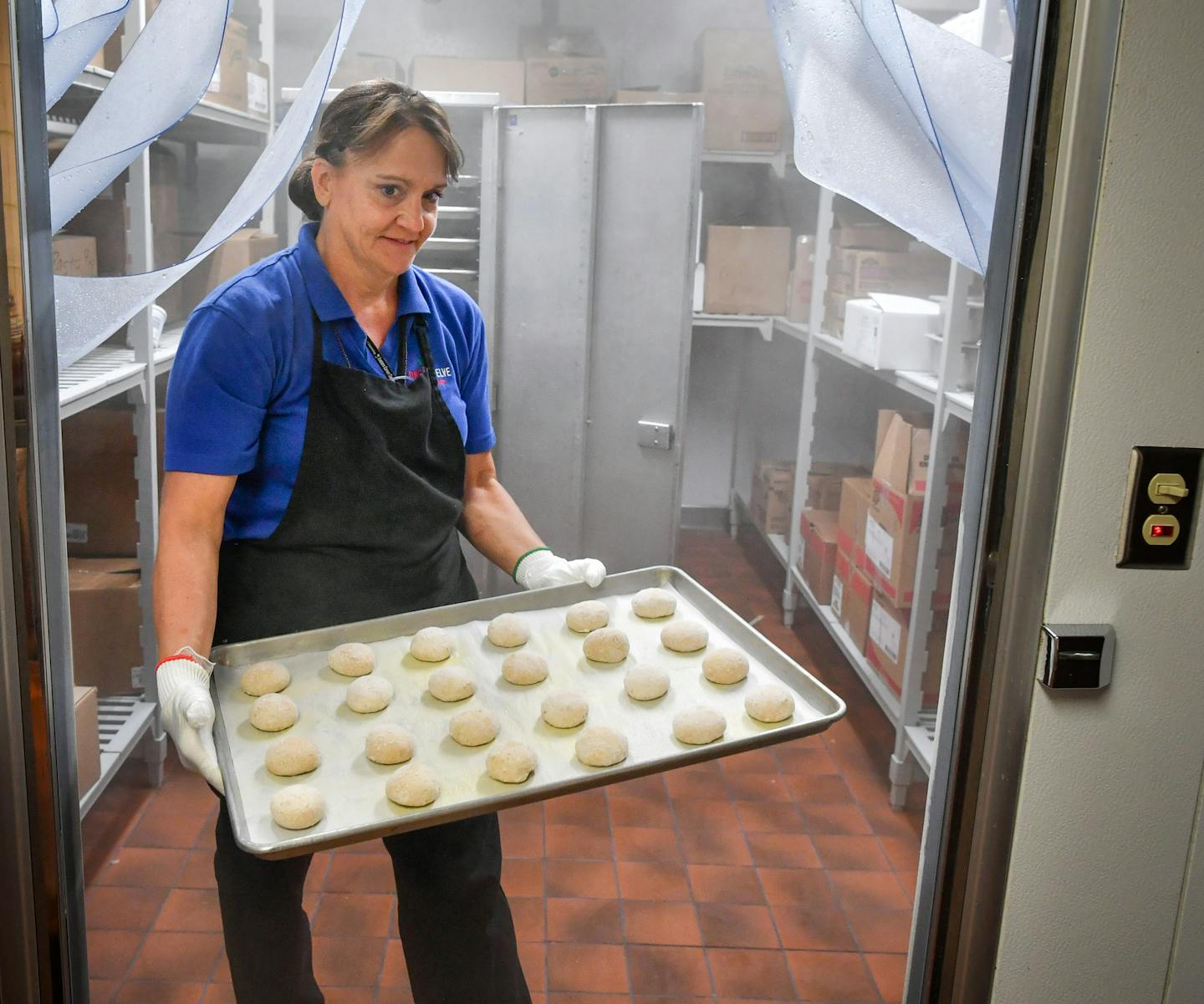 Jan Young, kitchen manager for Chaska Middle School brought some frozen dinner rolls from the freezer. They are thawed, or proofed, in a refrigerator overnight, raised in a warm oven and baked fresh in the morning. ] GLEN STUBBE * gstubbe@startribune.com Monday, September 19, 2016 New studies show that schools have made significant improvements in school lunches from farm-to-school initiatives, hired chefs and simple scratch recipes. But Minnesota parents are still concerned that students are no