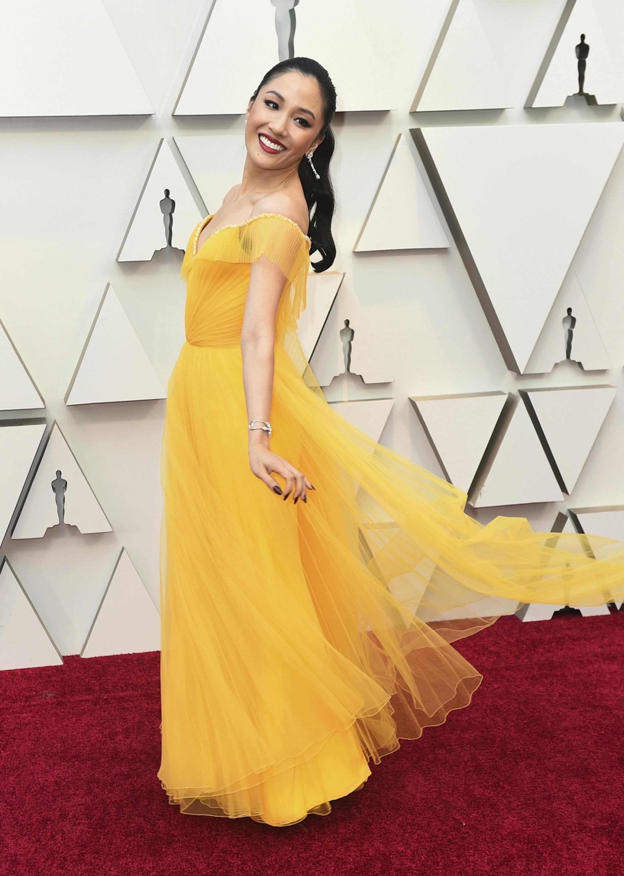 Constance Wu arrives at the Oscars on Sunday, Feb. 24, 2019, at the Dolby Theatre in Los Angeles.