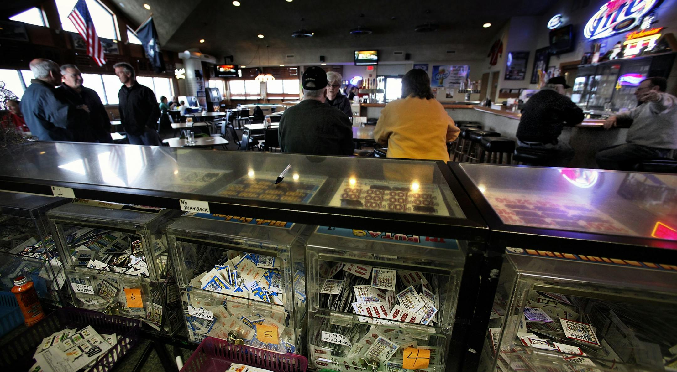 Several types of pull tab games are for sale behind a counter at the American Legion post in Chanhassen.