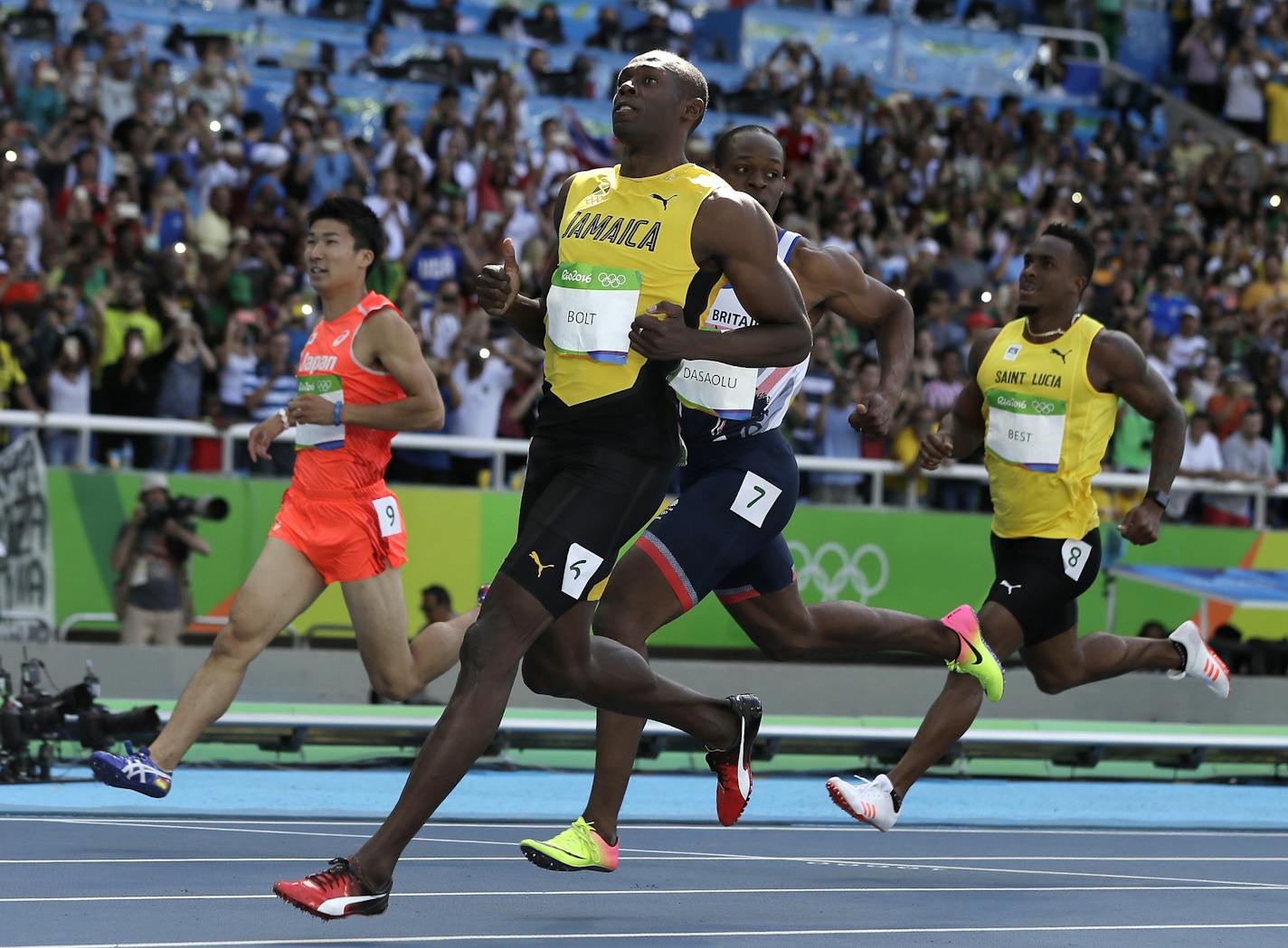 Jamaica's Usain Bolt checks his time during a men's 100-meter first round heat at the athletics competitions in the Olympic stadium of the 2016 Summer Olympics in Rio de Janeiro, Brazil, Saturday, Aug. 13, 2016. (AP Photo/Matt Slocum)