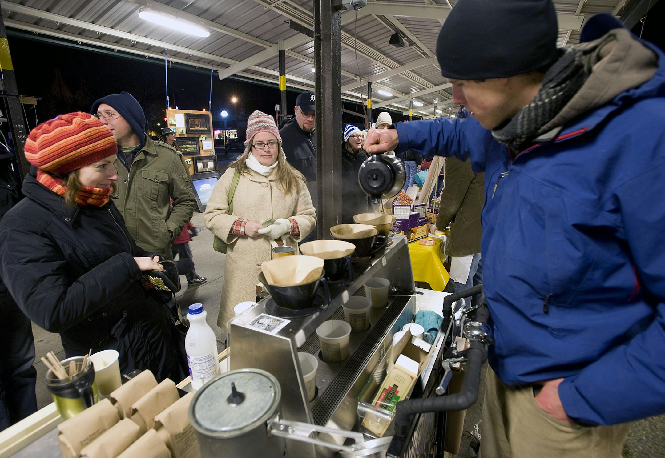 The Kerrytown farmer's market, offering coffee and other treats, is open every Saturday through the winter -- and it's right across the street from Zingerman's Deli. (Photo by