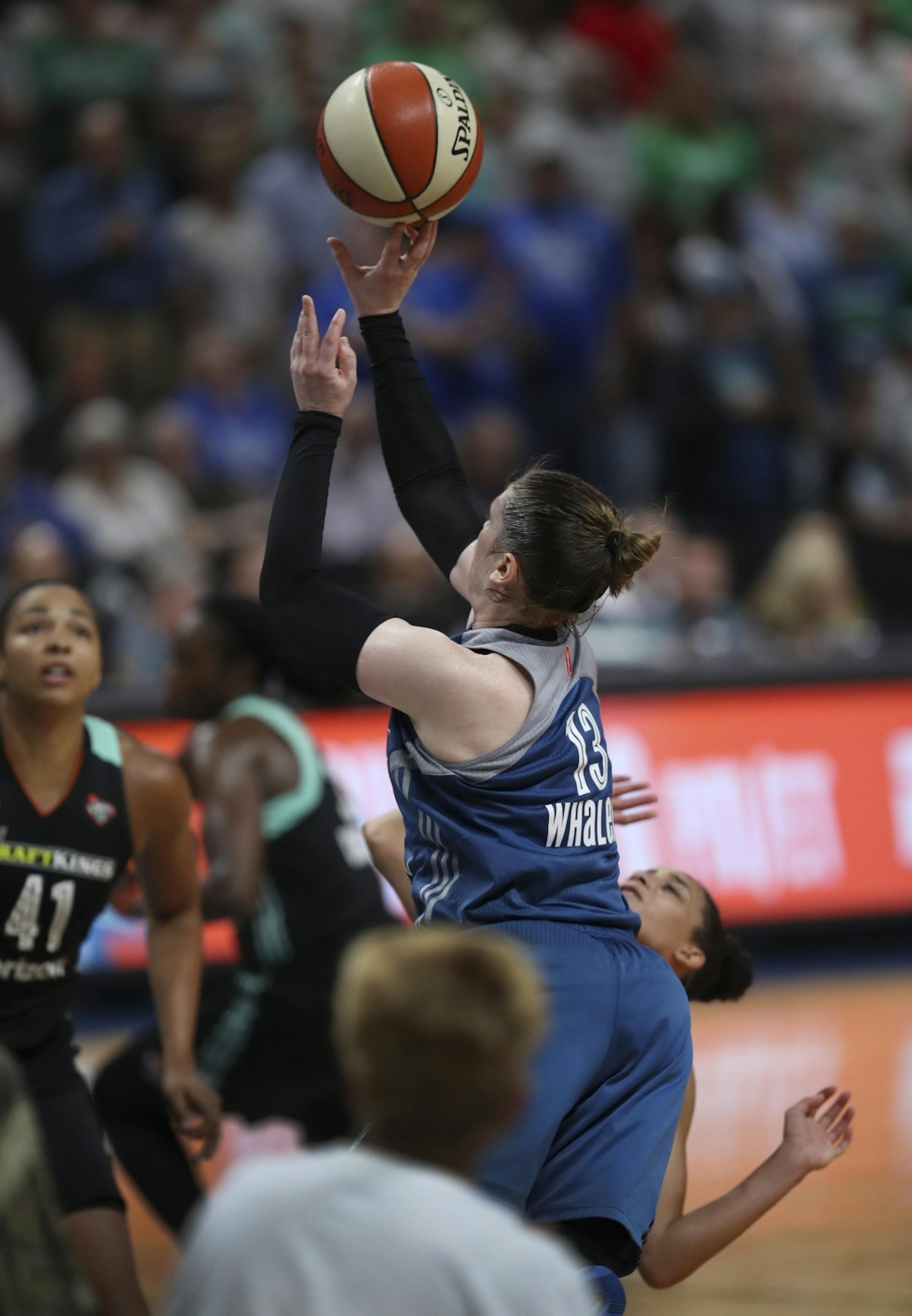 Minnesota Lynx guard Lindsay Whalen (13) put up what proved to be the winning basket with under a minute left in the game Tuesday night.