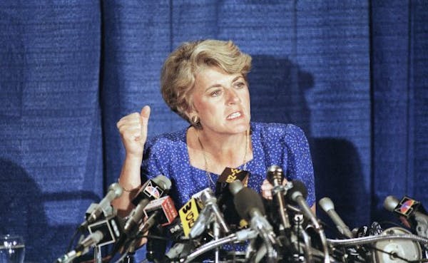 FILE - In this Aug. 21, 1984 file picture, Geraldine Ferraro explains the finances of herself and husband during a news conference in the Queens borou