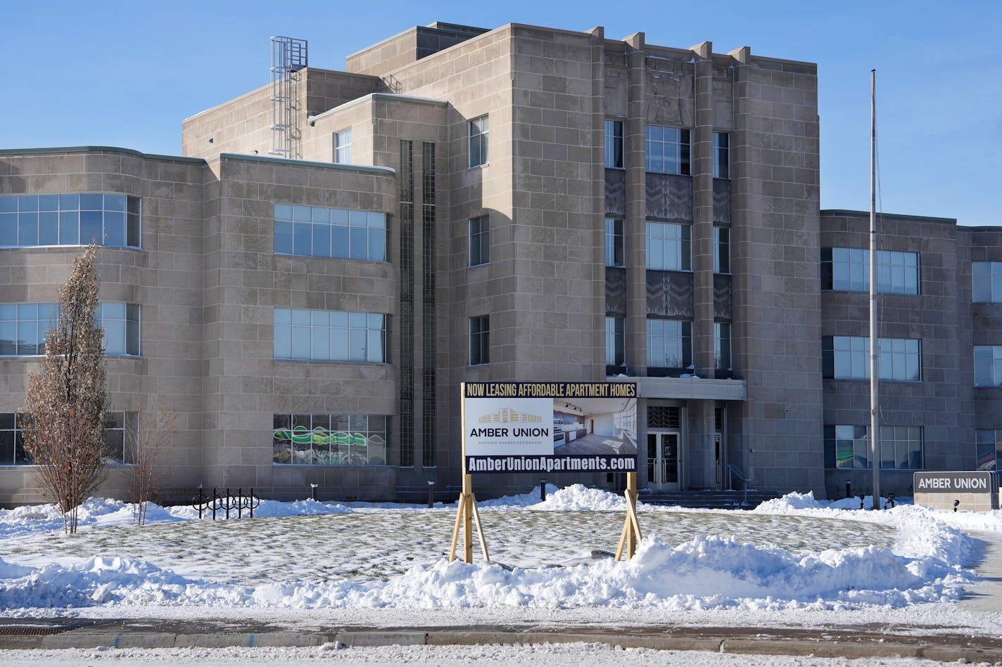 A sign advertises open units at the Amber Union Apartments.