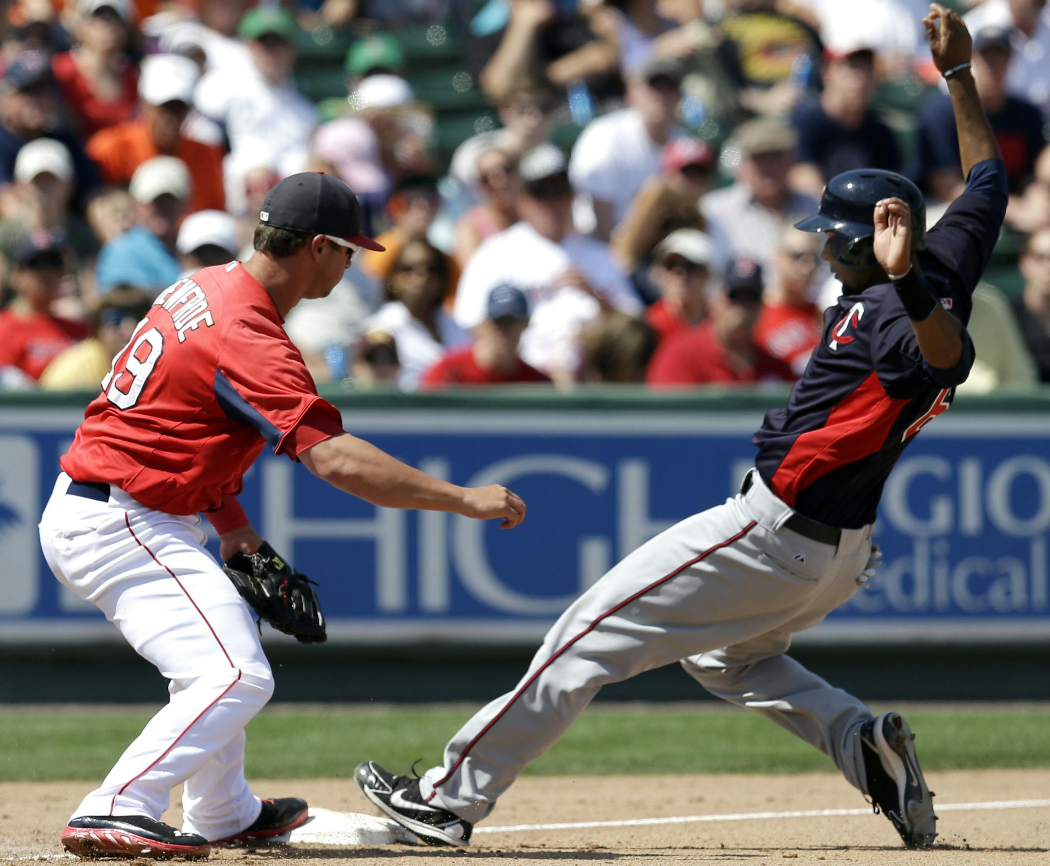 New Twins center fielder Aaron Hicks, right (shown in spring training), said he "felt more excitement than [cold]" as he got acquainted with Target Field on Sunday.