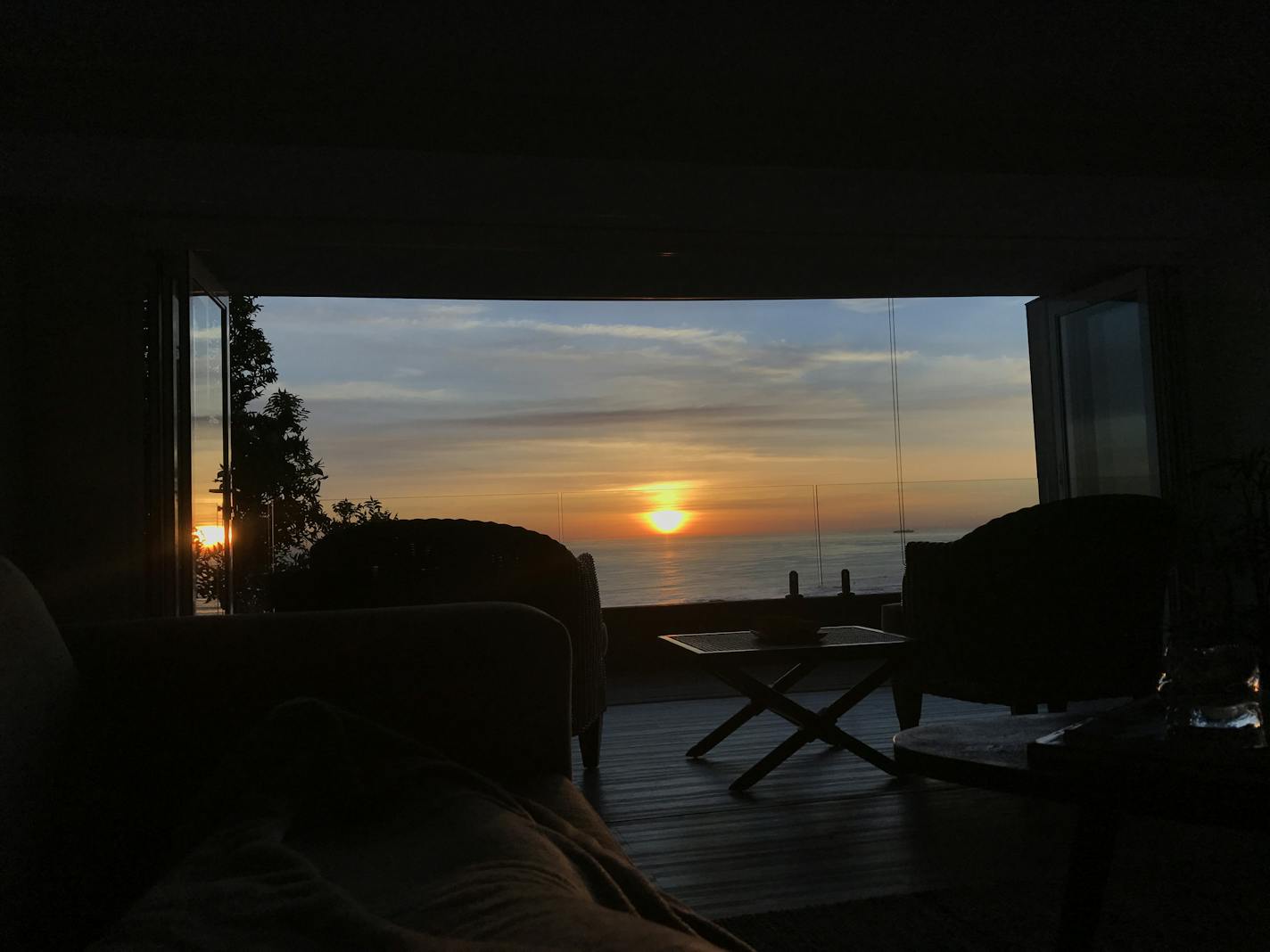 The sun sets outside a window during Rick Kupchella and his family's annual vacation. Provided photo