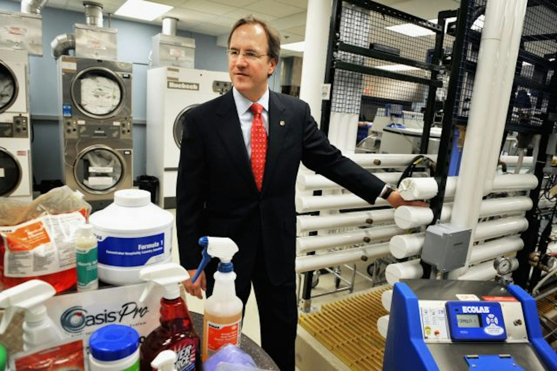 Ecolab CEO Doug Baker showed off a company research lab in Eagan.