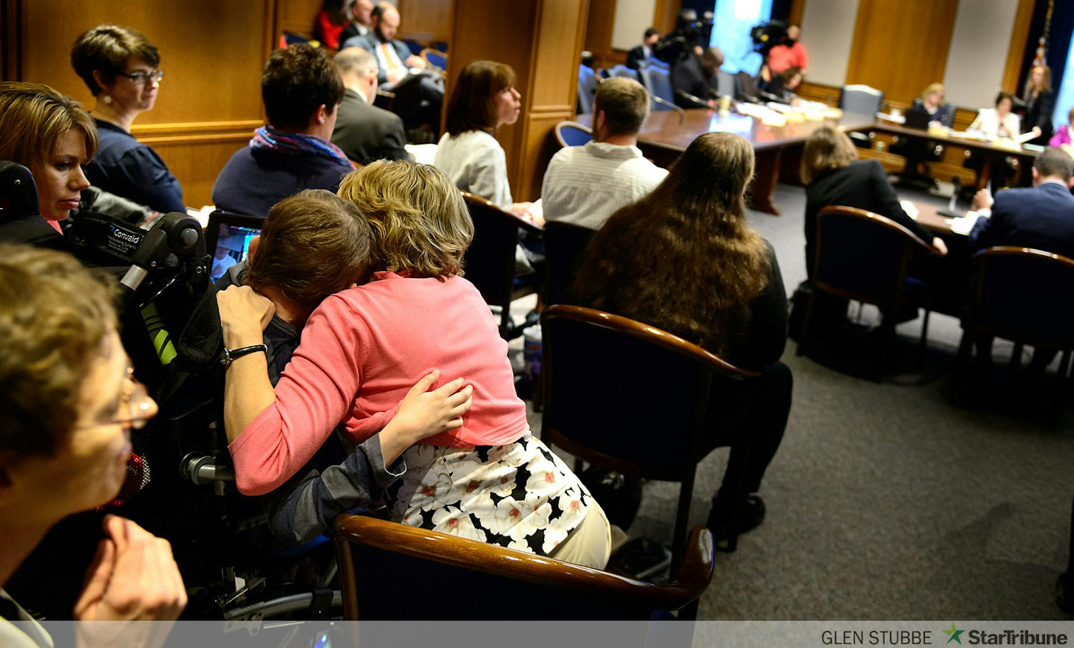 Kathy Engstrom of Rogers, hugged her son Nolan, 16, who has epilepsy and suffers from daily seizures.  Cannabis has helped reduce seizures and improved quality of life for people with that condition.     ]    The Senate Health and Human Services Committee voted 7-3 to allow patients with certain medical conditions to obtain a doctor's prescription and obtain small amounts of marijuana.   Friday April 25, 2014   GLEN STUBBE * gstubbe@startribune.com